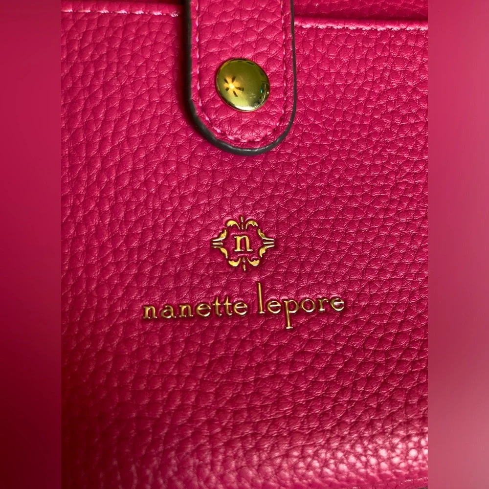 Nanette Lepore, pretty pink and gold, wristlet with lots of card storage